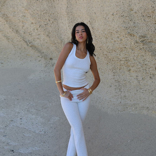 Damen trendiges Sport-Outfit mit schickem Oberteil und enganliegenden Leggings Drune