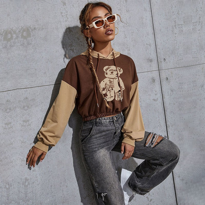 Damen Kurzgeschnittener Kapuzenpullover mit Teddy‑Print, Colorblock‑Ärmeln und elastischem Saum Drune