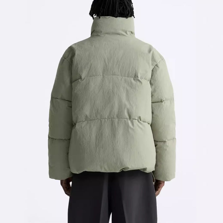Herren Kurz geschnittener Pufferblouson aus Daunenoptik mit hohem Stehkragen und Pattentaschen Drune