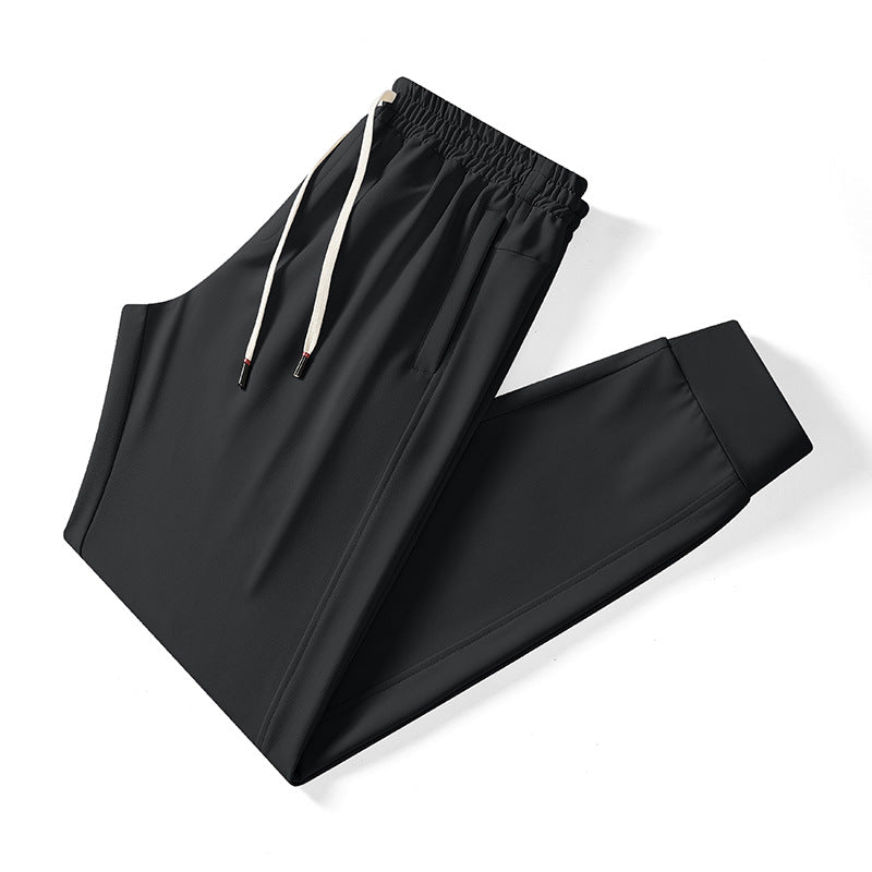 Herren athletische Tech-Jogginghose mit elastischem Kordelbund, verdeckten Reißverschlusstaschen und formgebenden Knöchelbündchen Drune