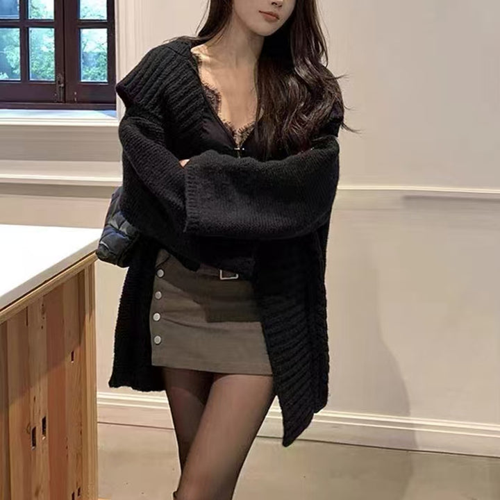 Damen oversized Strickjacke mit voluminösen Ärmeln und strukturierter Oberfläche Drune