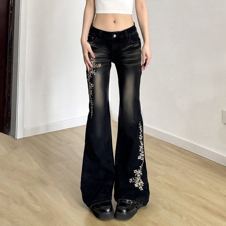 Damen hochtaillierte Schlagjeans mit floraler Stickerei und verwaschenem Look Drune
