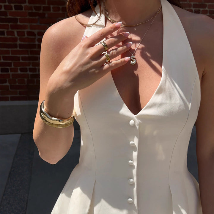 Damen Halterneck-Bluse mit taillierter Passform und Knopfleiste Drune