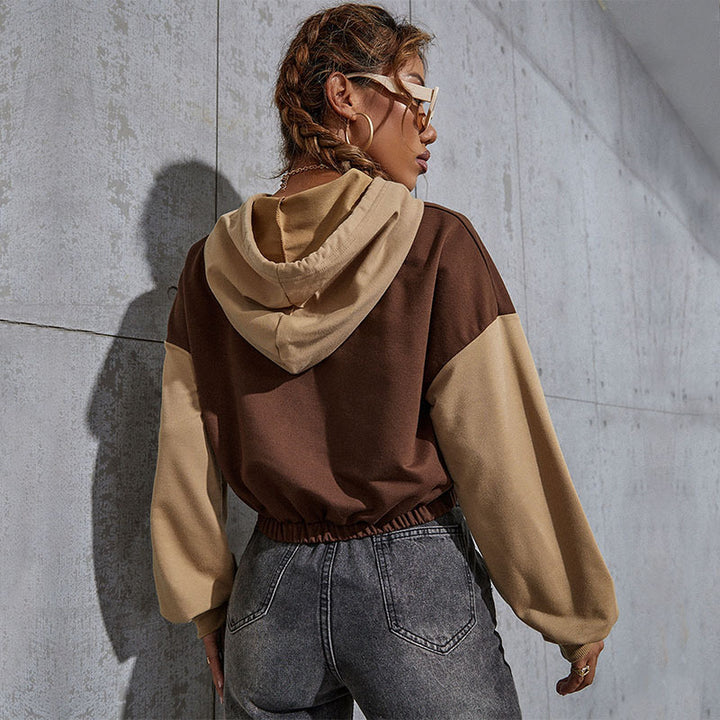 Damen Cropped Hoodie mit Kontrastärmeln, elastischem Saum und schmelzendem Smiley-Print Drune