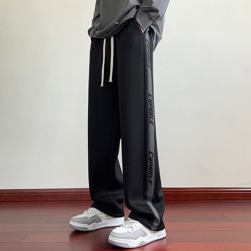Herren Sportliche Freizeithose mit elastischem Bund und seitlichen Grafiken
