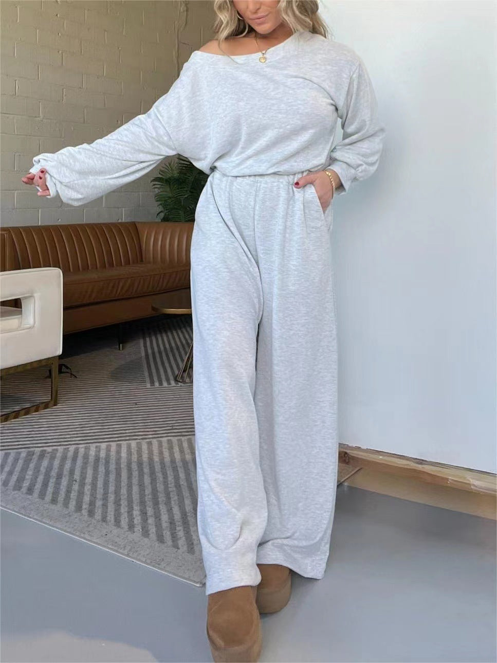 Damen Komfortabler Jumpsuit mit weit geschnittenen Beinen und tiefem Ausschnitt Drune