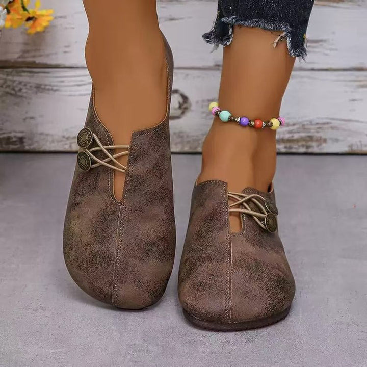 Damen Komfortable und stilvolle Slipper mit dekorativen Schnürdetails Drune