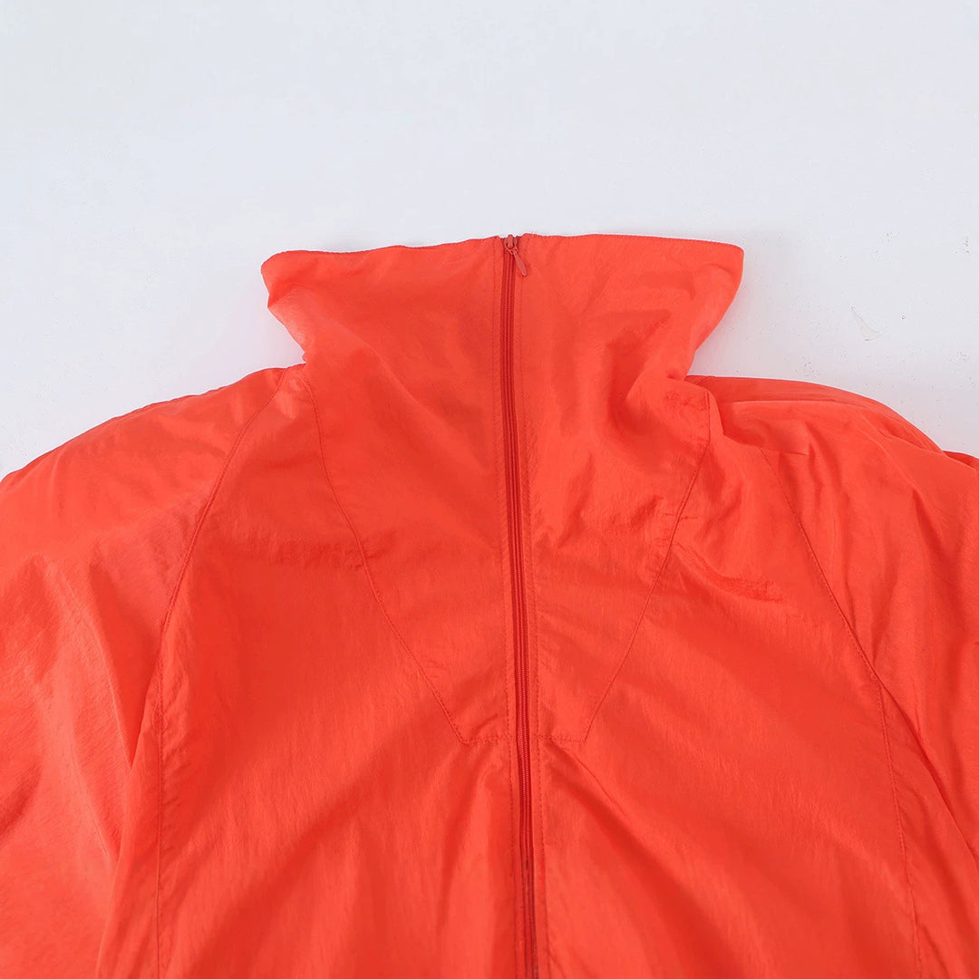 Damen Leichte Windjacke mit hohem Kragen, Tunnelzug‑Taillierung und Elastikbündchen Drune