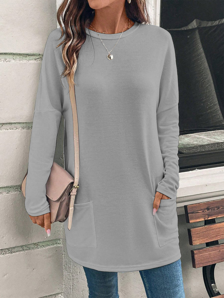 Weit geschnittene lange Tunika für Damen mit rundem Ausschnitt, seitlichen Taschen und weichem Jersey Drune