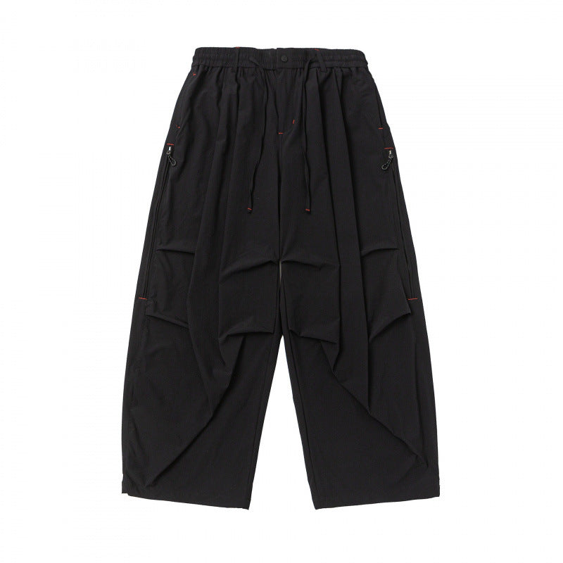 Unisex Weitgeschnittene technische Cargo-Hose mit Gummibund, Kordelzug und Reißverschlusstaschen Drune