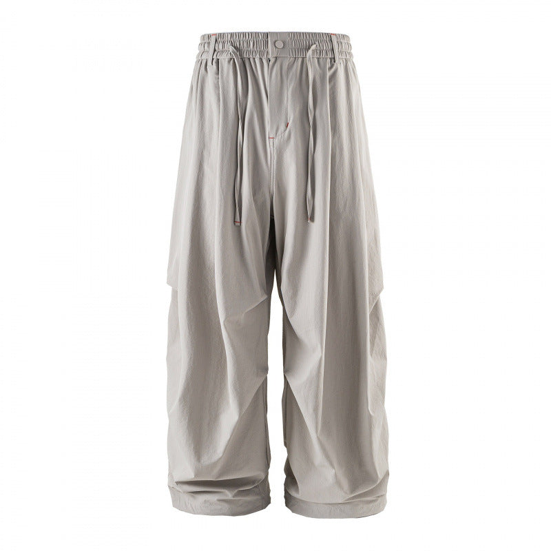 Unisex Weitgeschnittene technische Cargo-Hose mit Gummibund, Kordelzug und Reißverschlusstaschen Drune