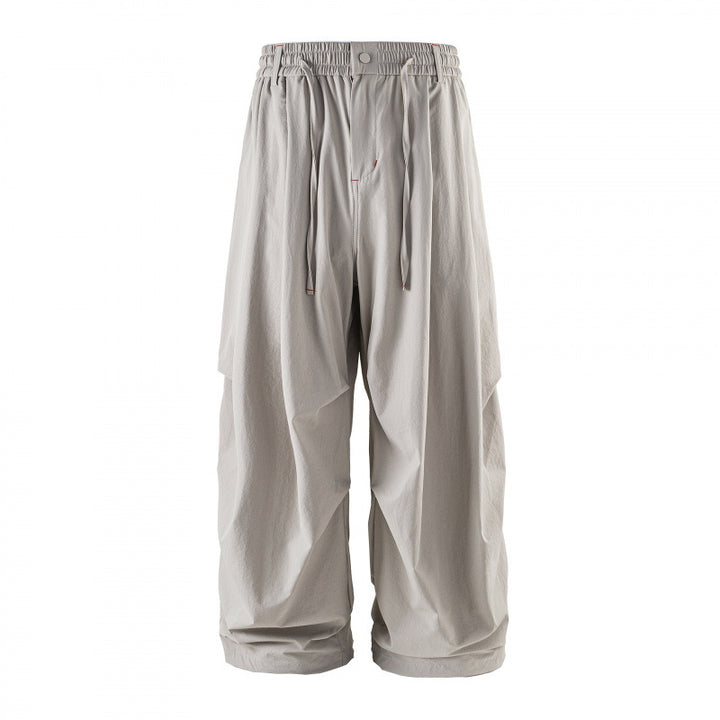 Unisex Weitgeschnittene technische Cargo-Hose mit Gummibund, Kordelzug und Reißverschlusstaschen Drune