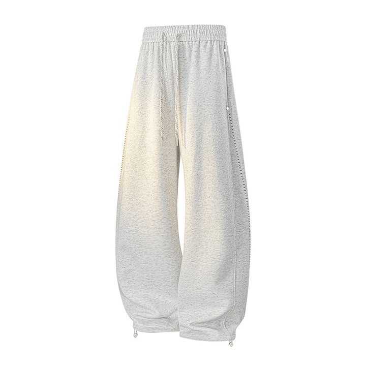 Herren Oversize-Baggy-Jogginghose mit Tunnelzug, seitlicher Druckknopfleiste & verstellbaren Beinabschlüssen Drune