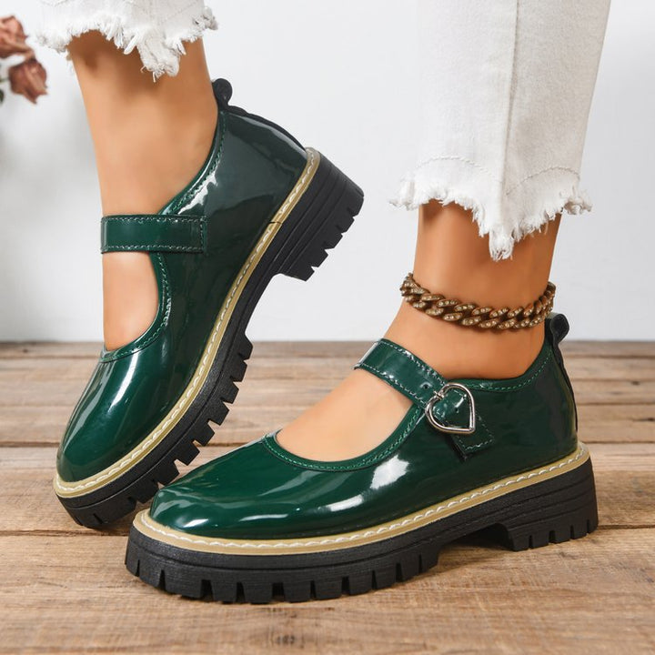Damen Riemchen‑Slipper im Mary‑Jane‑Stil mit grober Profilsohle und Herzschließe Drune