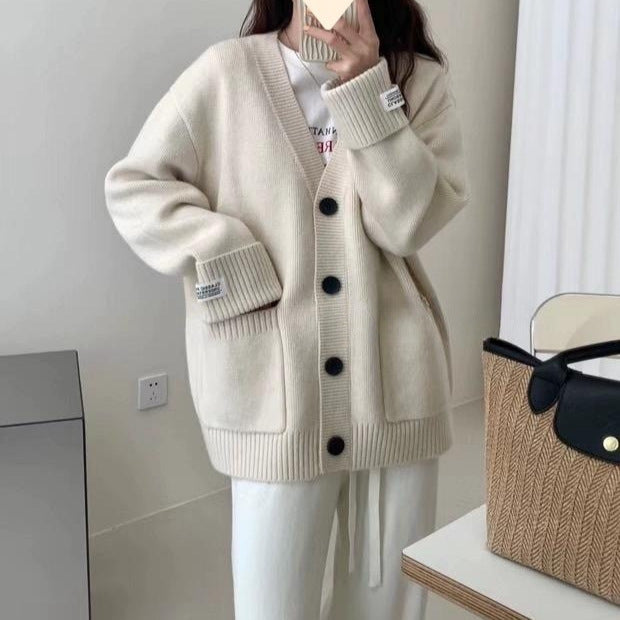 Damen Gemütliche Strickjacke mit tiefem V-Ausschnitt und großen Taschen Drune