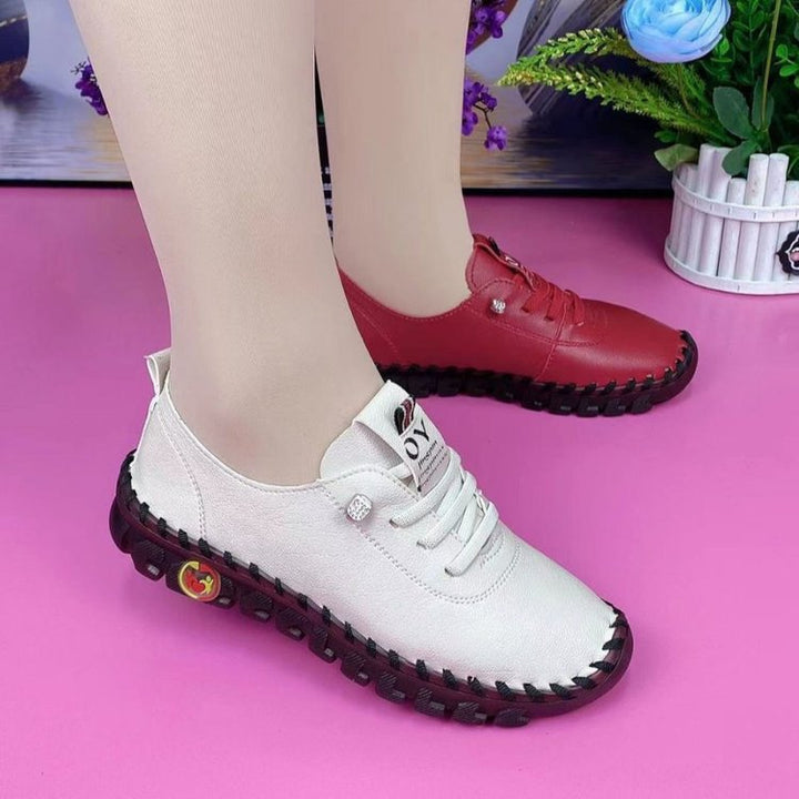 Damen Flexible Lederoptik-Sneaker mit handgenähter Kontrastnaht und profilierter Gummilaufsohle Drune