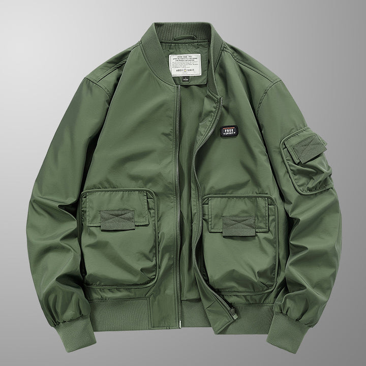 Herren Leichte Nylon-Bomberjacke im Utility‑Stil mit großen Fronttaschen und Ärmeltasche Drune