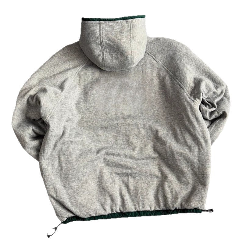 Unisex nan weit geschnittene Windjacke mit Kapuze wattiertem Fleeceinnenfutter Tunnelzugsaum und Zierstreifen an Ärmeln Drune