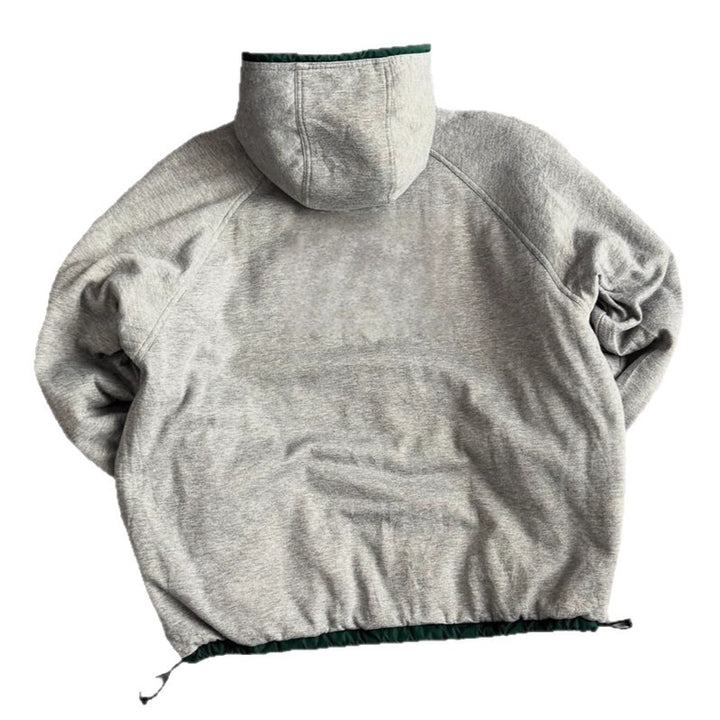 Unisex nan weit geschnittene Windjacke mit Kapuze wattiertem Fleeceinnenfutter Tunnelzugsaum und Zierstreifen an Ärmeln Drune