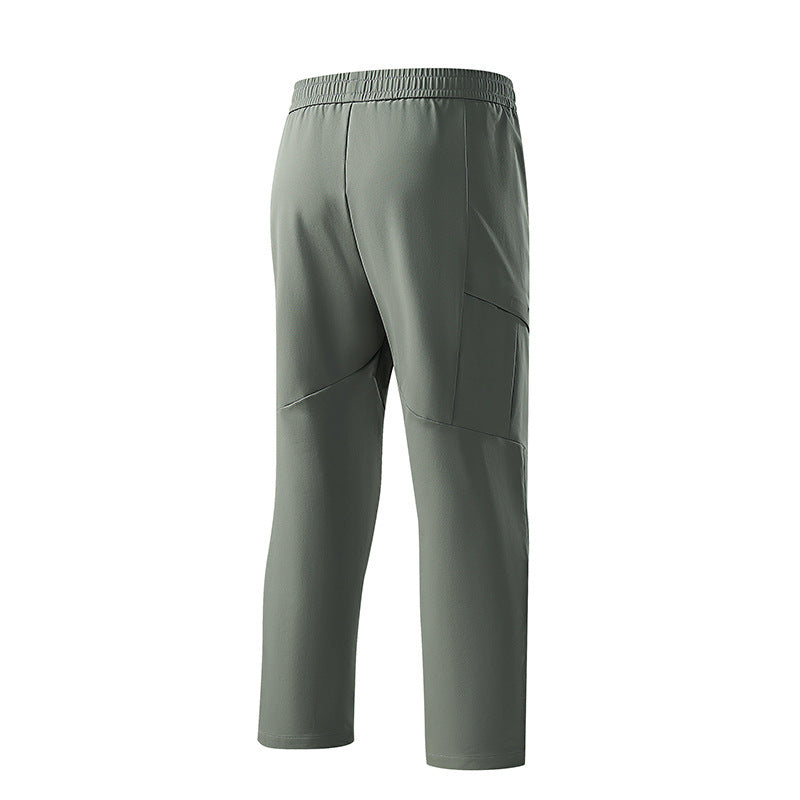 Herren Technische tapered Trainingshose mit elastischem Bund, 4‑Wege‑Stretch und Reißverschlusstaschen Drune
