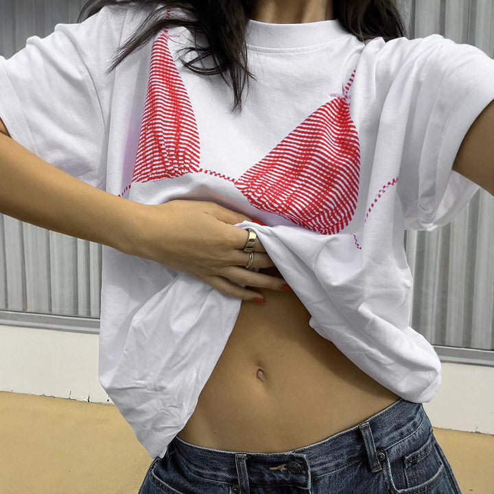 Damen lockeres T-Shirt mit grafischem Bikini-Print Drune