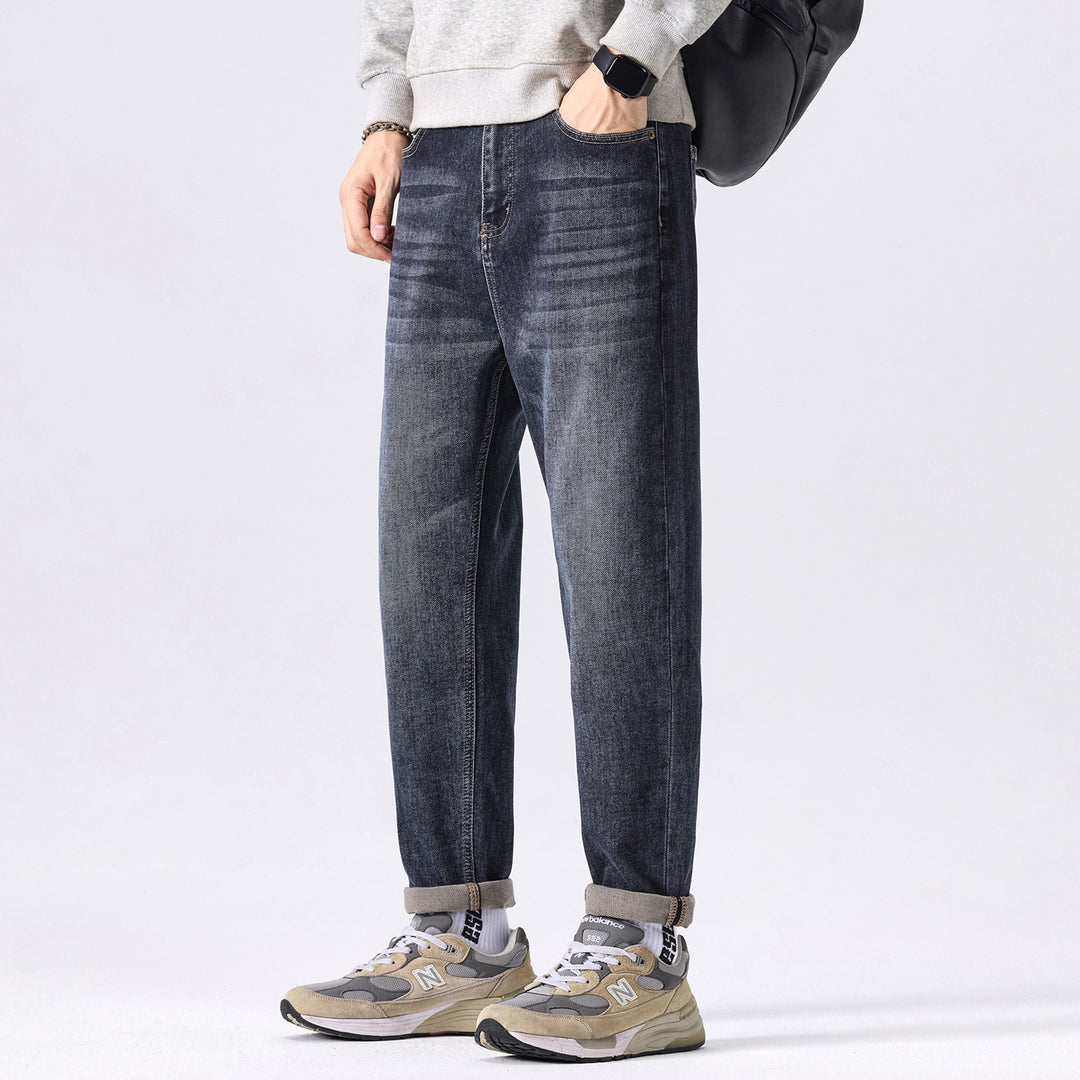 Herren konisch geschnittene Denimhose mit mittlerer Leibhöhe, relaxed Fit und dezenter Used-Optik Drune