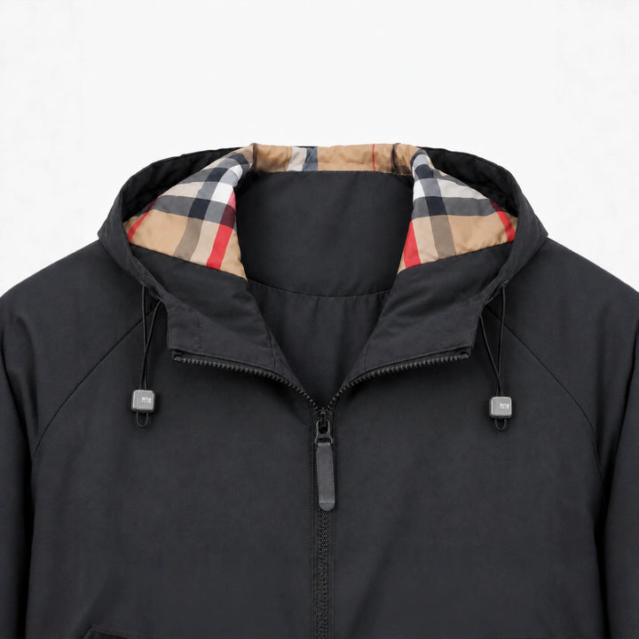 Herren leichte winddichte Softshell‑Kapuzenjacke mit kariert gefütterter Kapuze Drune