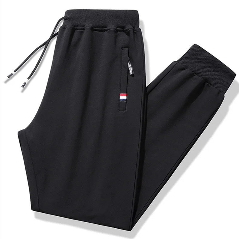 Herren Tapered-Jogginghose mit Tunnelzug, Reißverschlusstasche & Rippbündchen Drune