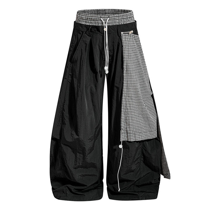 Damen weite Baggy-Hose mit asymmetrischem Karo-Seitenteil und Tunnelzug Drune