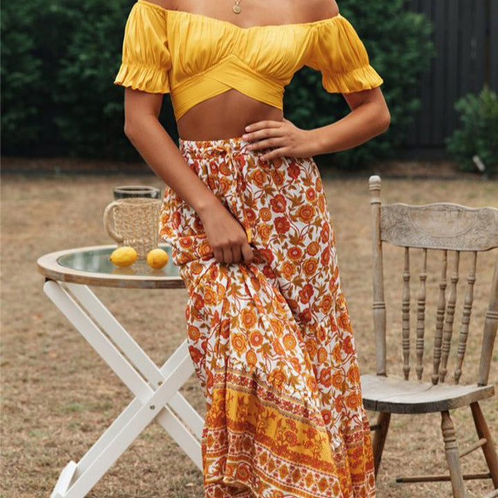 Damen Crop-Top mit fließenden Puffärmeln und knielangen Details Drune