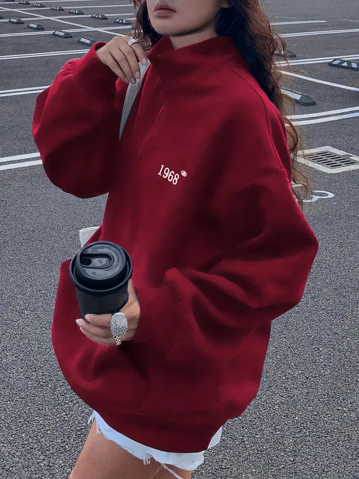 Damen oversized Hoodie mit kurzem Reißverschluss, hohem Stehkragen und Kängurutasche Minimalstick Drune