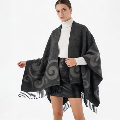 Damen Wollmix-Poncho mit Jacquard‑Wirbelmuster, V-Ausschnitt und Fransen Drune