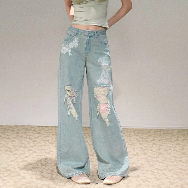 Damen Weit geschnittene Jeans mit individuellen Destroyed-Details und floralem Print Drune
