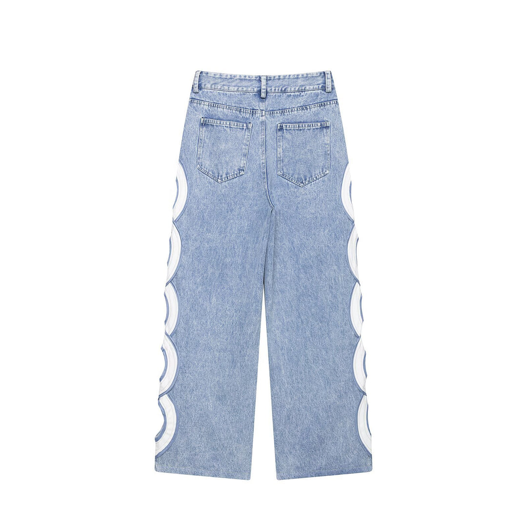 Damen High-Waist-Jeans mit ausgestellter Weitbein-Silhouette und seitlichen Kreis-Applikationen Drune