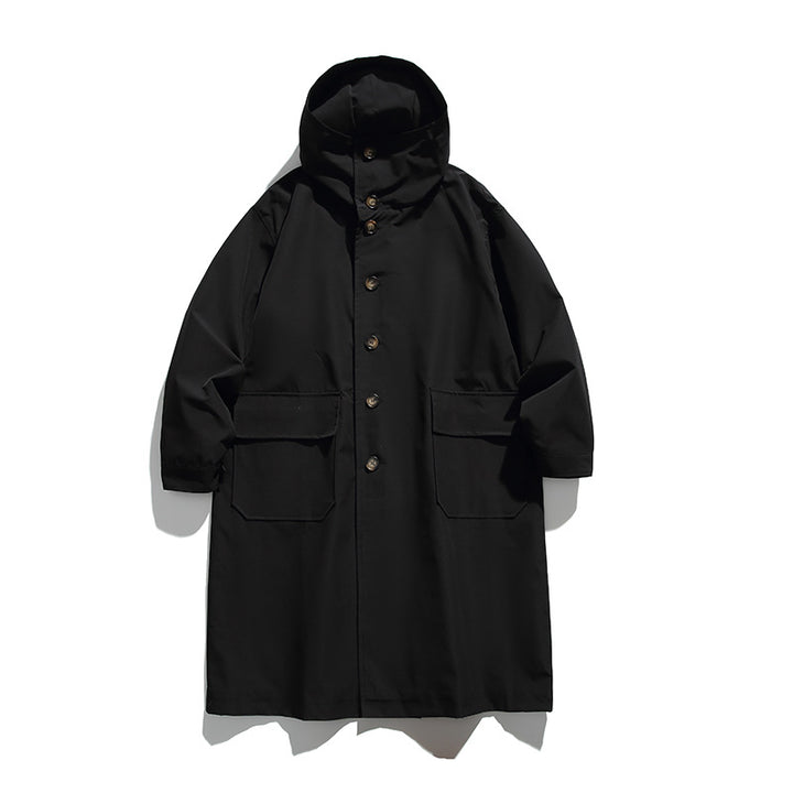 Unisex Langer Kapuzenmantel im Boxy‑Cut mit verdeckter Knopfleiste und großen Pattentaschen Drune