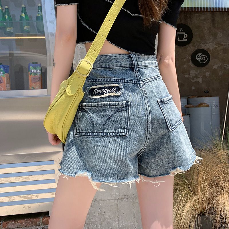 Damen Jeansshorts mit fransigen Säumen und einzigartigem Stickdetail Drune