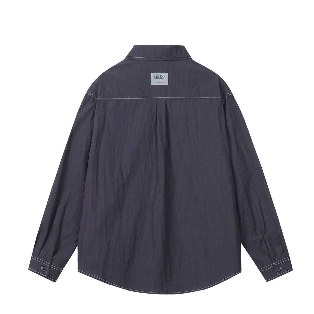 Unisex Oversize-Hemdjacke mit markanten Kontrastnähten und aufgesetzten Brusttaschen Drune