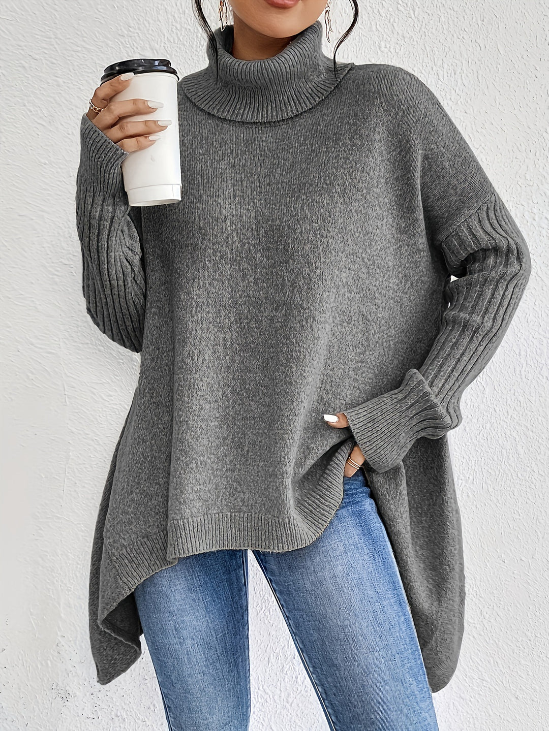 Damen nan Oversize Strickpullover mit hohem Rollkragen, gerippten Ärmeln und asymmetrischem Saum Drune