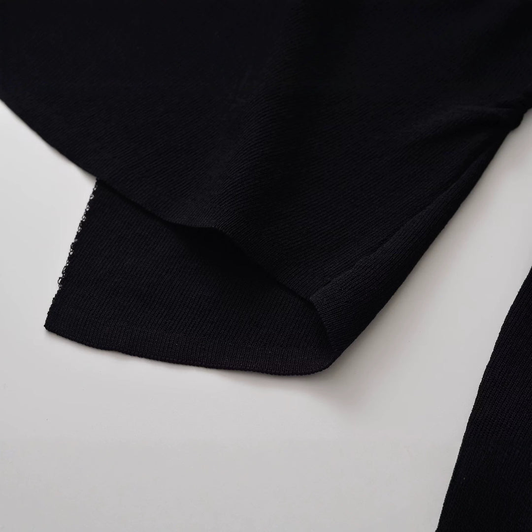 Damen Figurbetonte Rüschenbluse mit goldfarbenen Zierknöpfen und asymmetrischem Peplum Drune