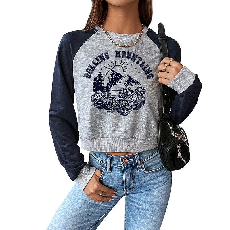 Damen Cropped Raglan-Sweatshirt mit Bergmotiv, Rippbündchen und lockerer Passform Drune