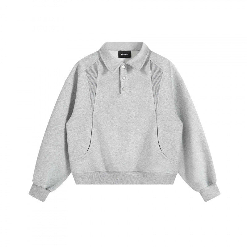 Unisex Boxy-Polo-Sweatshirt mit Henley-Knopfleiste, Raglanärmeln und Eingrifftaschen Drune