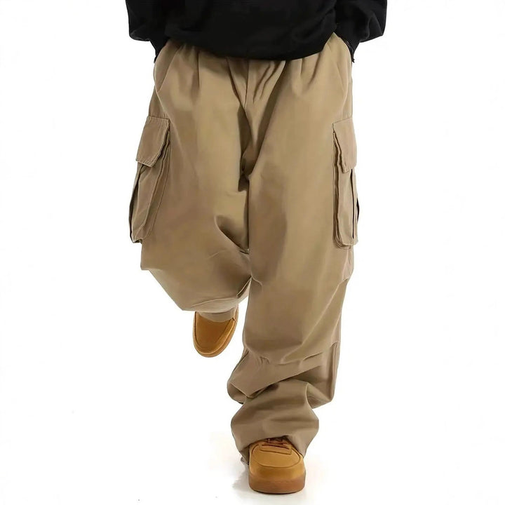 Herren Weite Baggy-Cargohose mit tiefem Schritt, großen Klappentaschen & relaxed Fit Drune