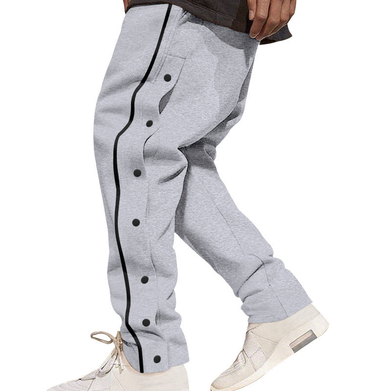 Herren nan weite Trackpants mit seitlicher Druckknopfleiste, elastischem Bund und reflektierendem Streamline-Streifen Drune