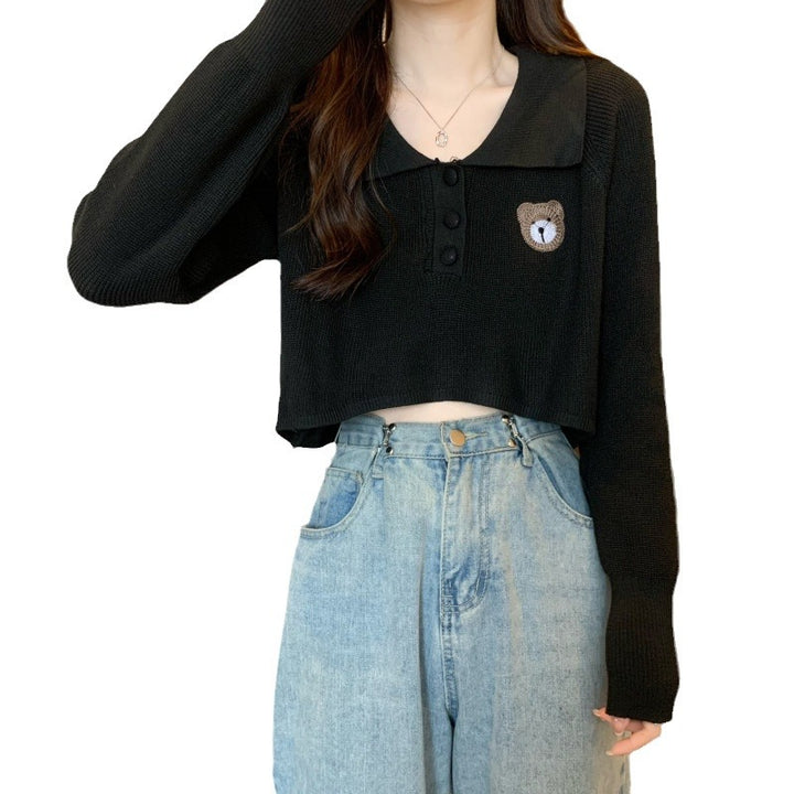 Damen Cropped Pullover mit einem Knopfverschluss und Einhorn-Emblem