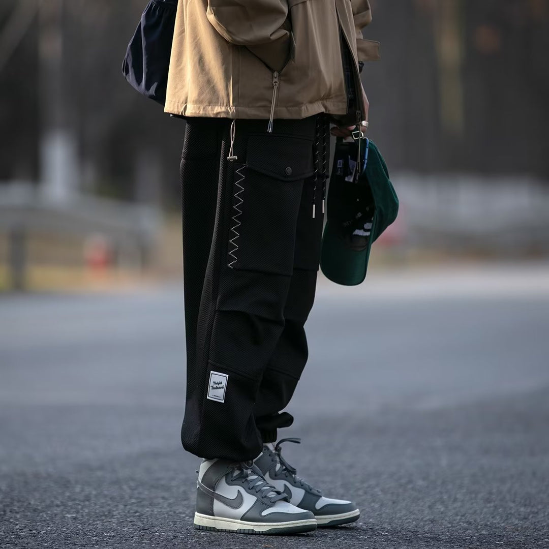 Herren weite Cargo-Jogginghose mit Kordelzug Klapptaschen und elastischen Bündchen Drune
