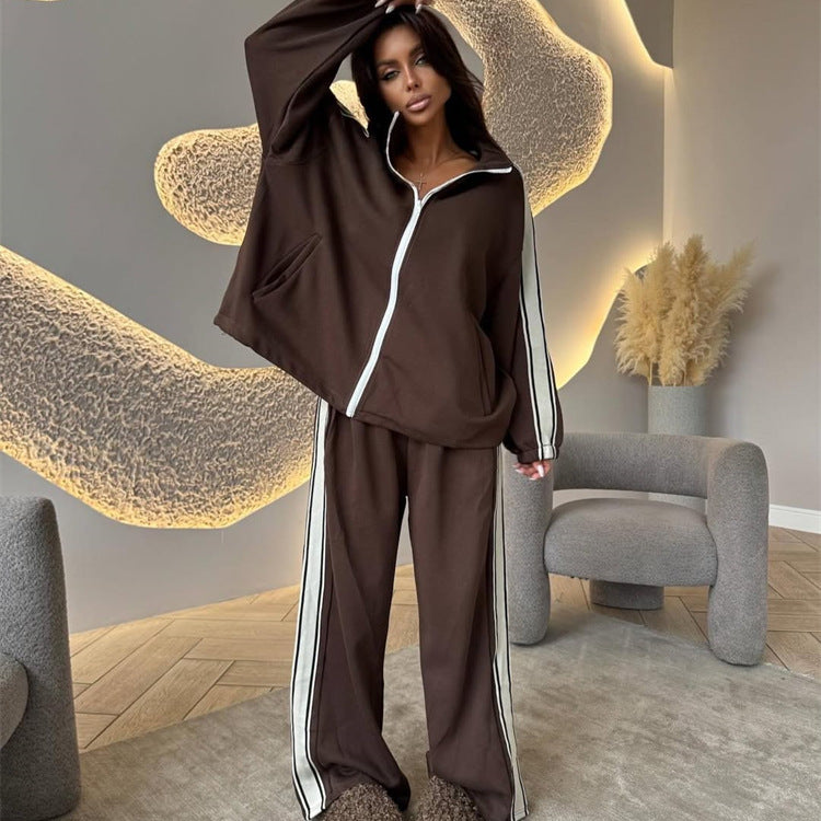 Damen weiches Oversize-Zweiteiler Trainingsset mit Reißverschlussjacke und weiter hochgeschnittener Jogginghose mit Kontraststreifen Drune