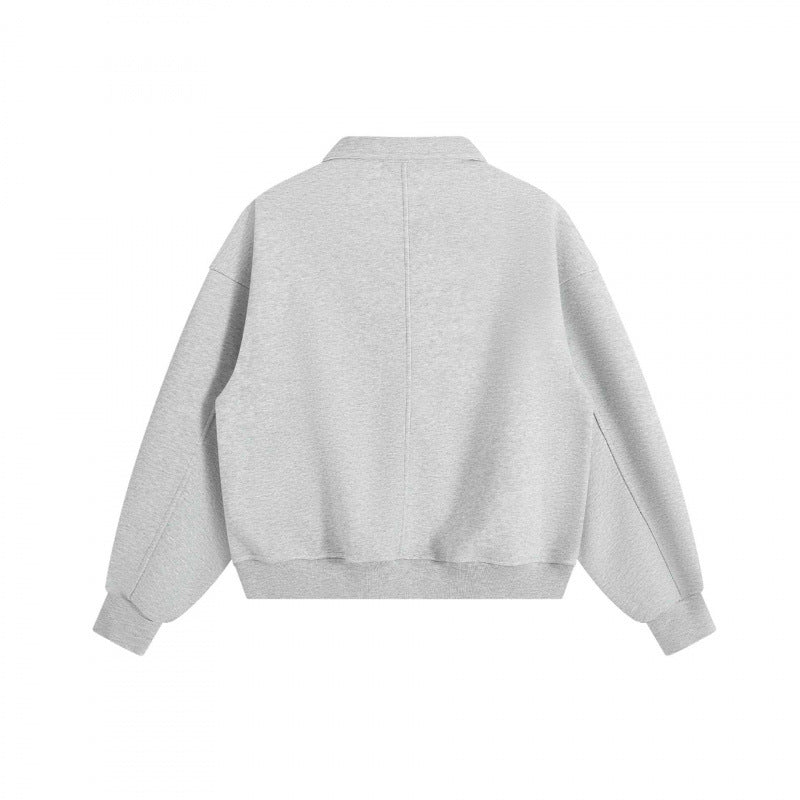 Unisex Boxy-Polo-Sweatshirt mit Henley-Knopfleiste, Raglanärmeln und Eingrifftaschen Drune