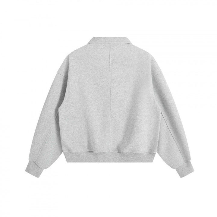 Unisex Boxy-Polo-Sweatshirt mit Henley-Knopfleiste, Raglanärmeln und Eingrifftaschen Drune