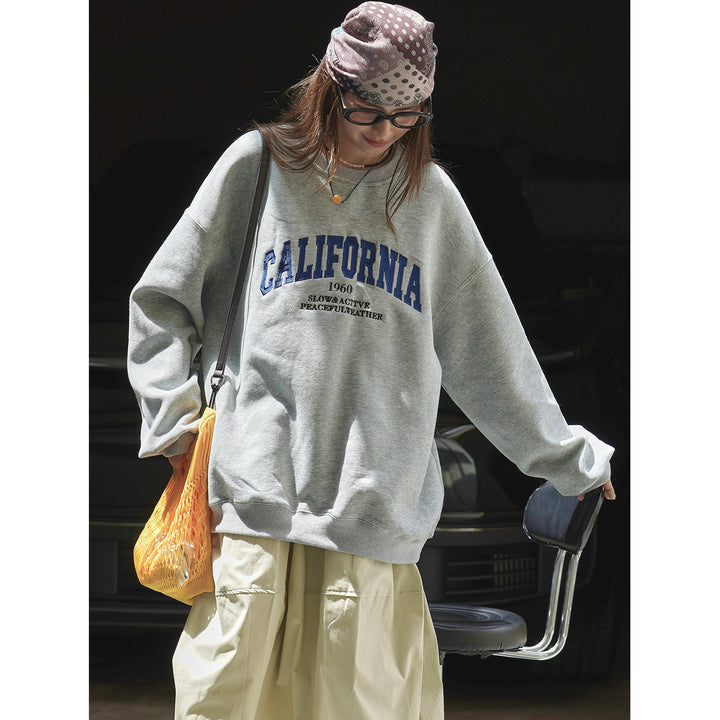 Damen Weites College‑Sweatshirt mit Rundhalsausschnitt und Statement-Print Drune