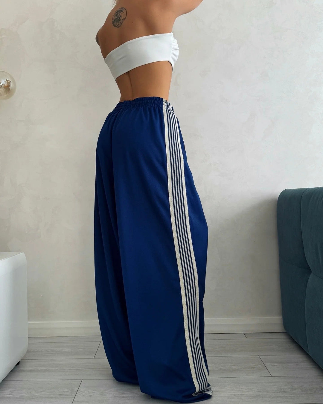 Damen weite Sporthose mit diagonalen Streifen Drune